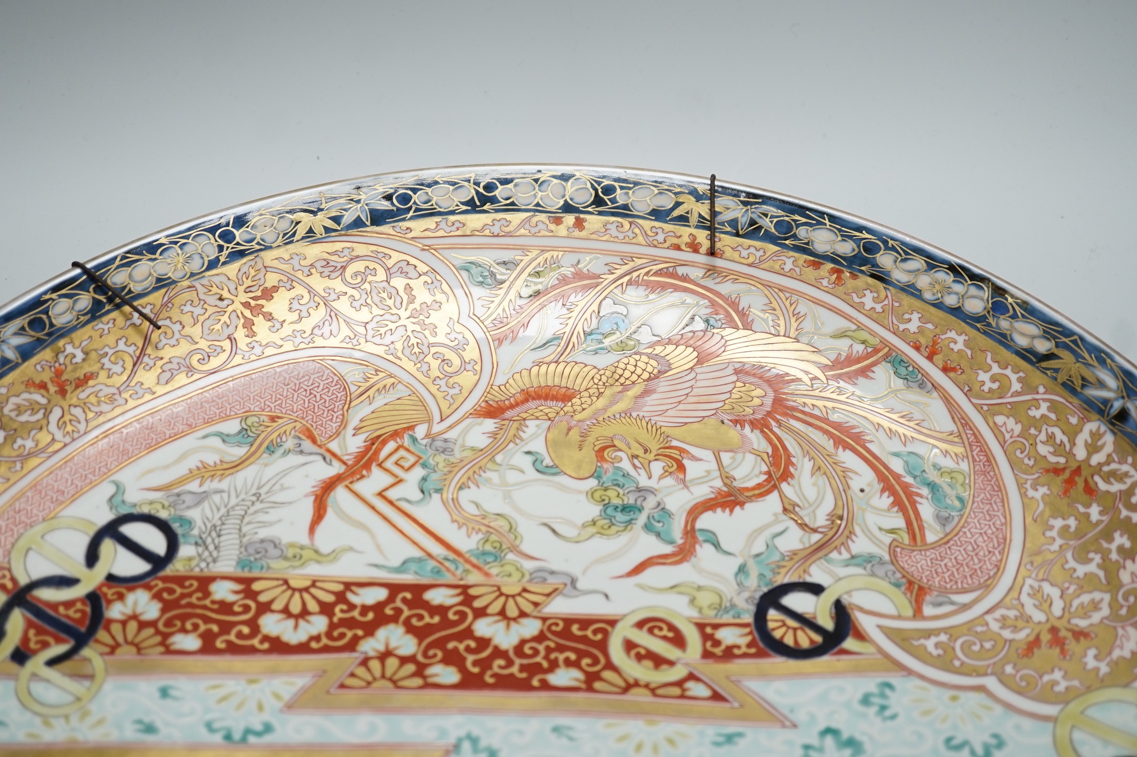 A Japanese Imari ‘dragon and phoenix’ charger, Meiji period, 46cm diameter